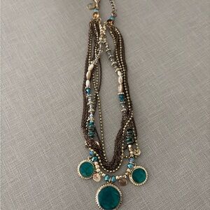 Elegant Multi-Strand Necklace with Turquoise Accents